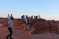 Horseshoe Bend, Tourists photograph a horseshoe at sunset 