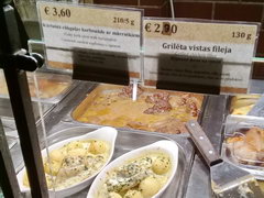 Prices in Riga in Latvia for food, baked meat at a dinning room