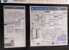 Buses in the towns of Scotland, stand near the stop with a detailed map of routes